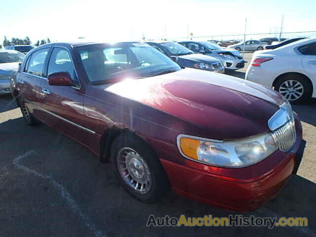 1999 LINCOLN TOWN CAR E, 1LNHM81W1XY689904