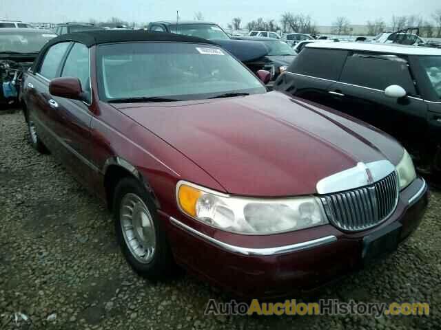 1999 LINCOLN TOWN CAR E, 1LNHM81W7XY693939