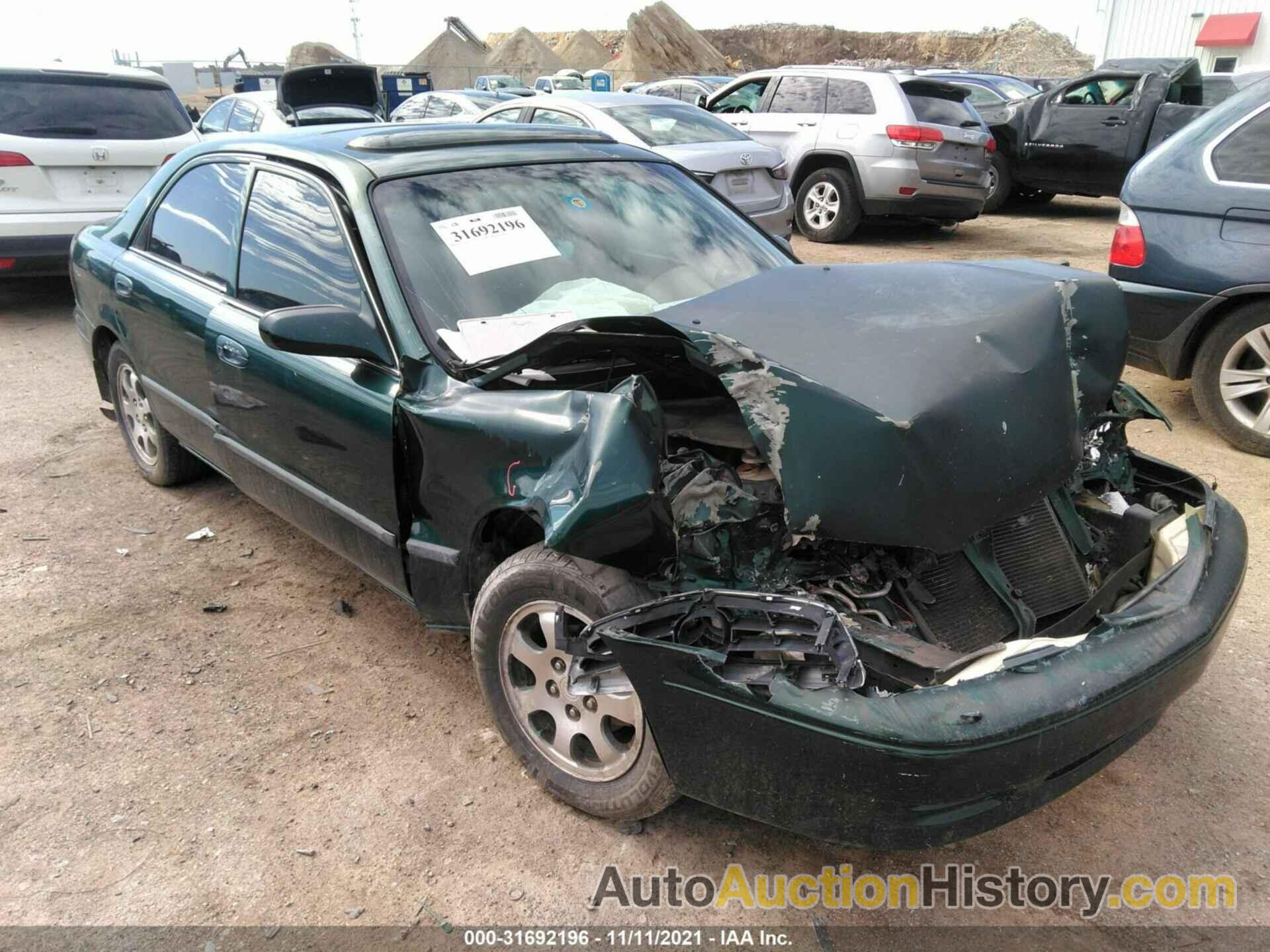 MAZDA 626 LX/ES, 1YVGF22CX15250117